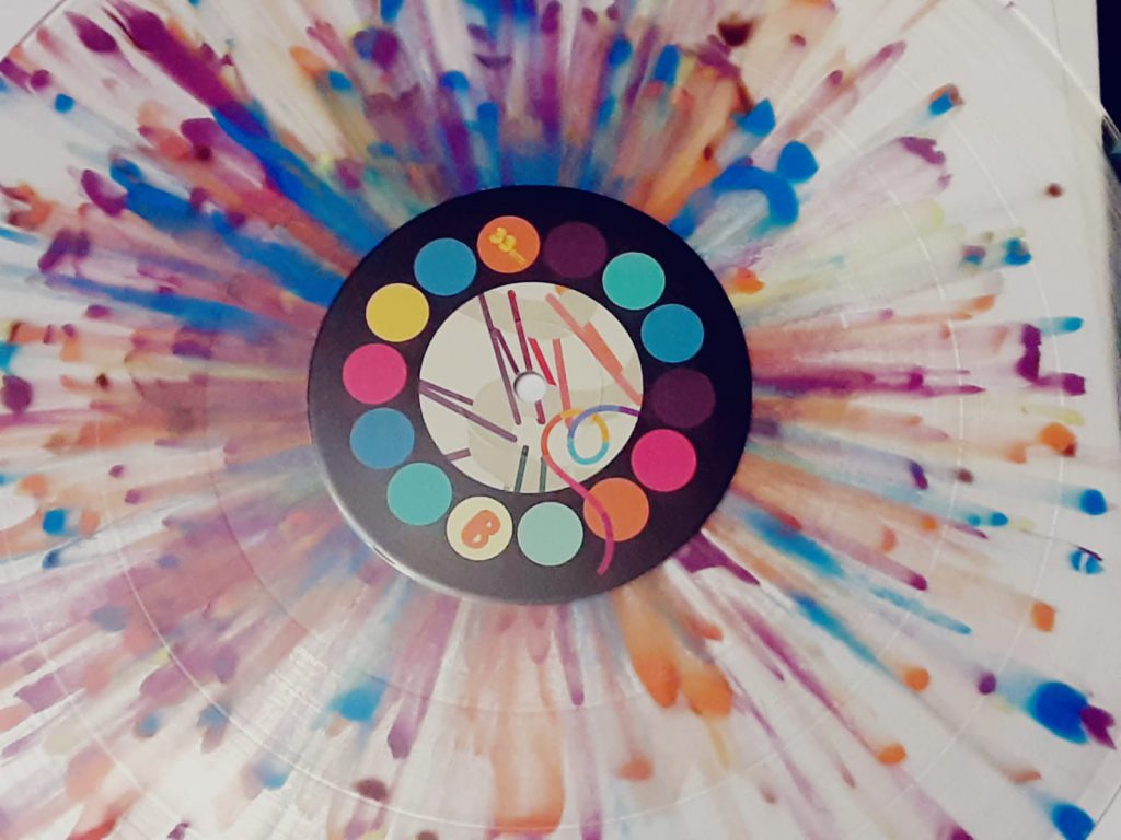 A vinyl record with a cool colorful pattern